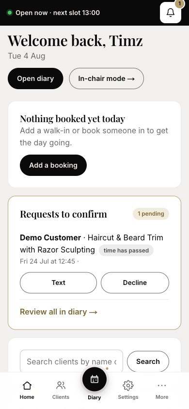 The Timz Trimz admin on a phone